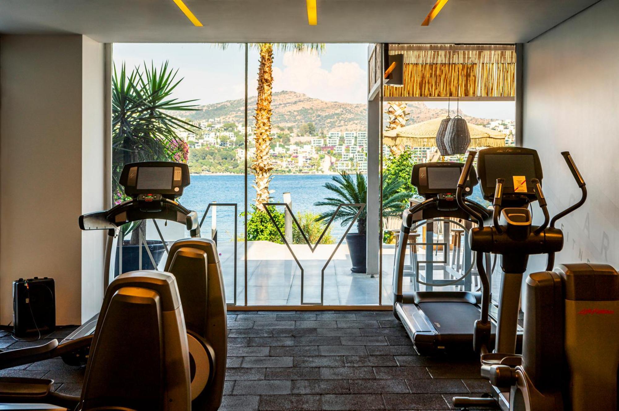 Cape Bodrum Luxury Hotel & Beach Гюндоган Екстериор снимка The gym at the hotel